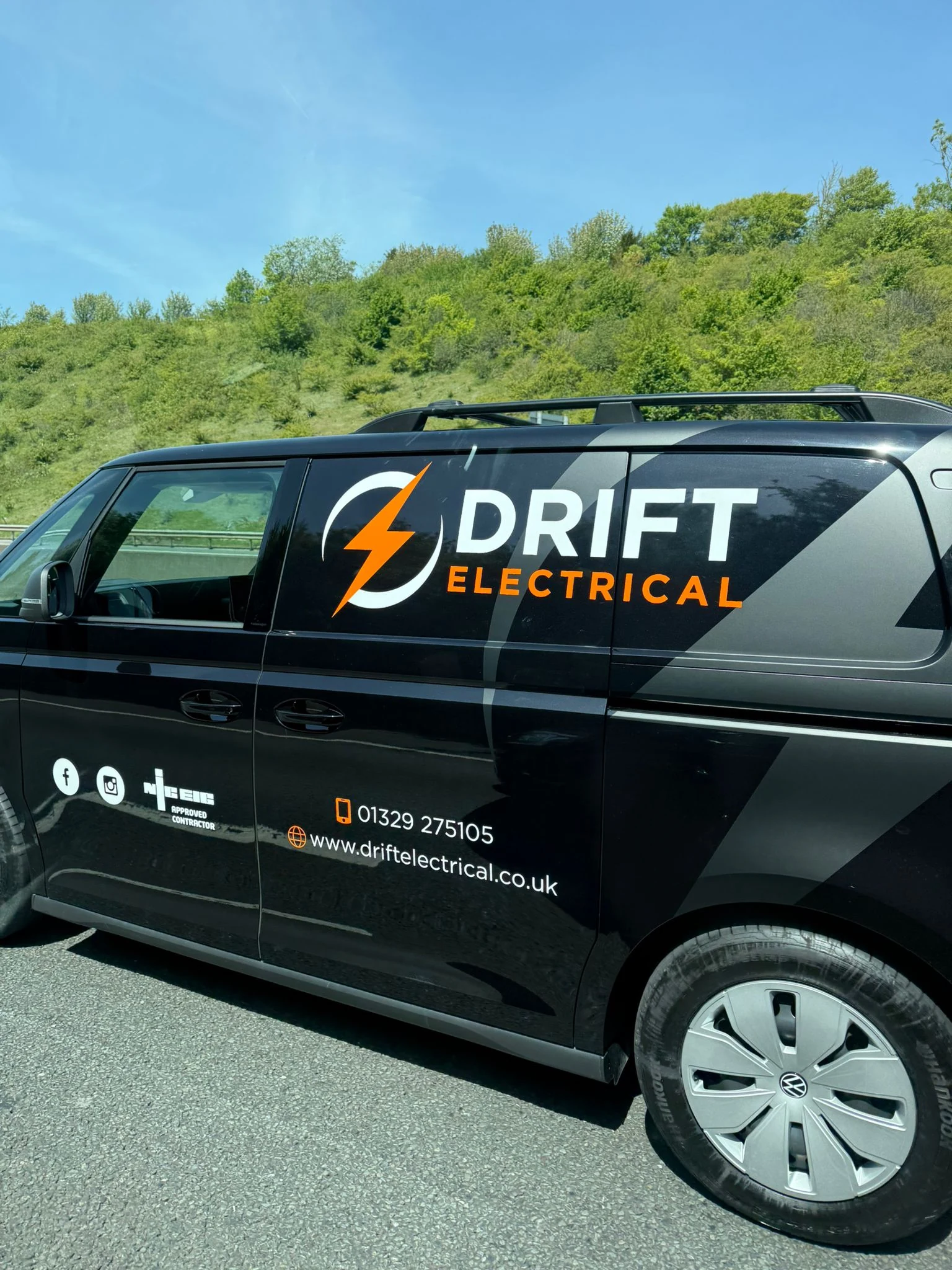 Drift Electrical branded Volkswagen ID Buzz van side view